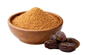 Bowl of date sugar powder next to fresh dates.